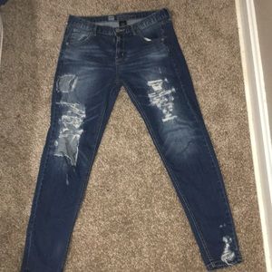 Distressed skinny/ boyfriend jeans